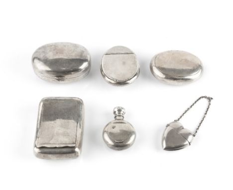 AN EDWARDIAN SILVER OVAL SNUFF BOX, by Andrew Barrett &amp; Sons, Birmingham 1908, 8.5cm; two further silver oval boxes; anot