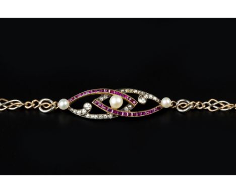 A RUBY, DIAMOND AND PEARL SET PANEL BRACELET, centred with two entwined openwork navette-shaped panels, highlighted by a trio
