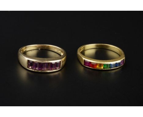 TWO GEM SET HALF HOOP RINGS, the first with a line of square step-cut gemstones of rainbow hues in channel setting, 18ct gold