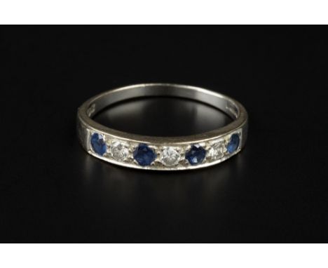 A SAPPHIRE AND DIAMOND HALF HOOP RING, alternately set with circular mixed-cut sapphires and round brilliant-cut diamonds, 18