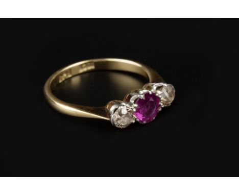 A RUBY AND DIAMOND THREE STONE RING, the circular mixed-cut ruby claw set between two old-cut diamonds, two colour precious m