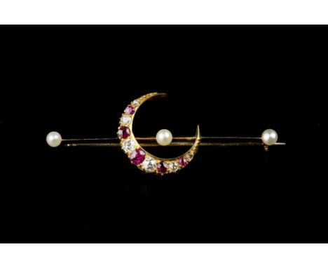 A VICTORIAN RUBY, DIAMOND AND PEARL CRESCENT BAR BROOCH, the knife-edged bar centred with a crescent of alternating mixed-cut