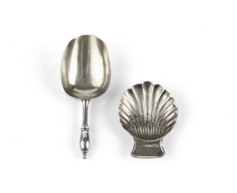 A 19TH CENTURY RUSSIAN SILVER CADDY SPOON, and another caddy spoon of scallop form, with import marks for London 1930 (2)