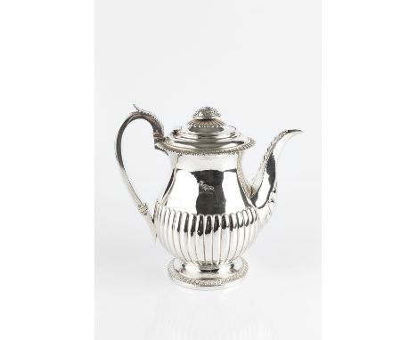 A GEORGE III SILVER TEAPOT, of half lobed baluster form, on gadrooned foot, by Rebecca Emes &amp; Edward Barnard, London 1818