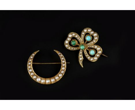 TWO HALF PEARL SET BROOCHES, the first a turquoise and half pearl set shamrock brooch, of openwork design, the second a cresc