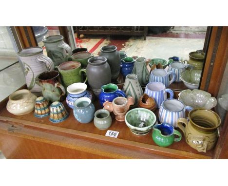 Shelf of studio pottery (20 pieces)