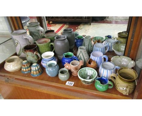 Shelf of studio pottery (20 pieces)