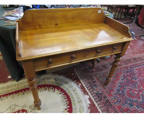 Light mahogany galleried washstand on turned legs