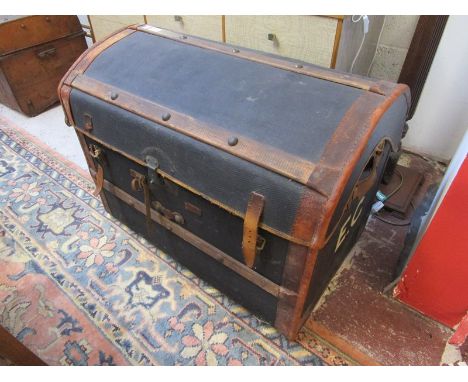 Large leather bound travelling trunk