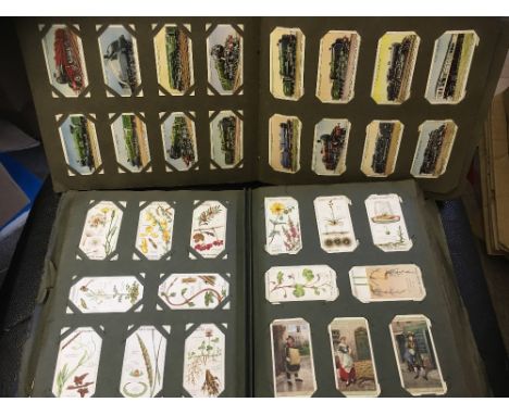 CIGARETTE CARDS : Two contemporary albums with various cards, some better topics noted. Wills, Churchman, Players.