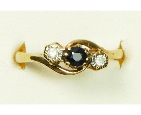 A 9ct gold three stone sapphire and brilliant cut diamond crossover ring, M, 2gm 