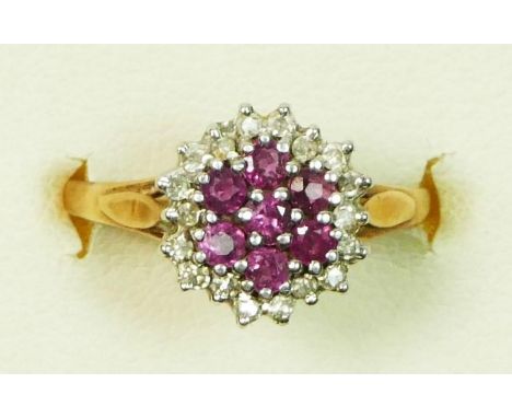 A 9ct gold ruby and diamond cluster ring, L, 2.2gm 