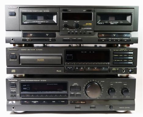 A Technics double cassette deck, RS-TR232, a Technics cd player SL-PG420A, and a Technics synthesizer receiver, SA-GX230D.Unt