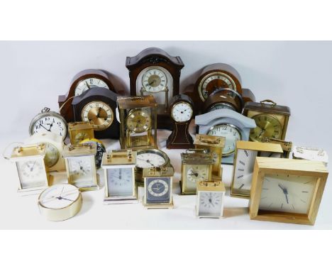 A collection of mantel clocks, to include carriage, anniversary and alarm clocks, having manual &amp; quartz movements. (3) 