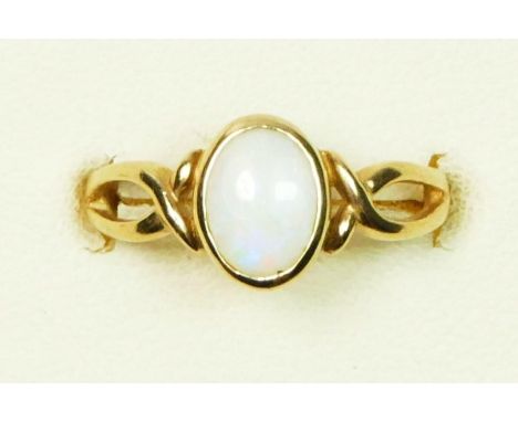 A 9ct gold and opal single stone ring, collet set with a good colour stone, 8 x 6mm, L, 1.9gm 