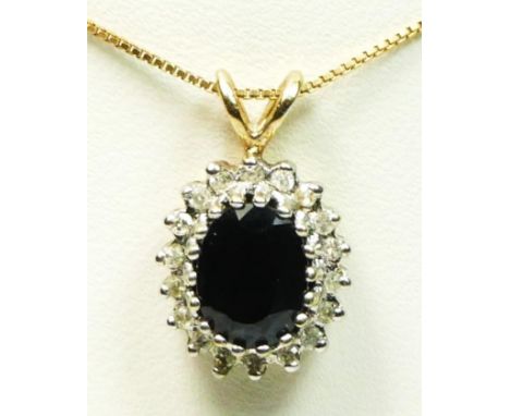 A 9ct gold sapphire and diamond set cluster pendant, 12 x 10mm, chain, 2.8gm 