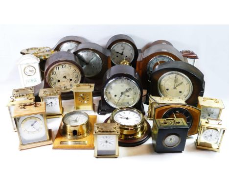 A collection of carriage clocks, lantern clocks and anniversary clocks, having manual &amp; quartz movements. (3) 