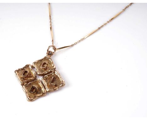 A 9ct yellow gold pendant, inscribed 'GOLD', 46mm high including bale, 8.7g, on 18ct yellow gold fancy link chain, 45cms long