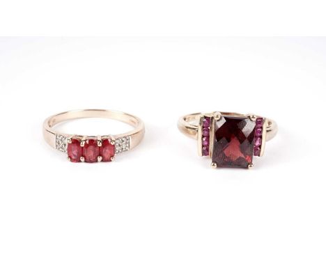 A red topaz and diamond ring, in 9ct yellow gold, size S; together with a garnet and ruby ring, 6.2g gross. (2) 