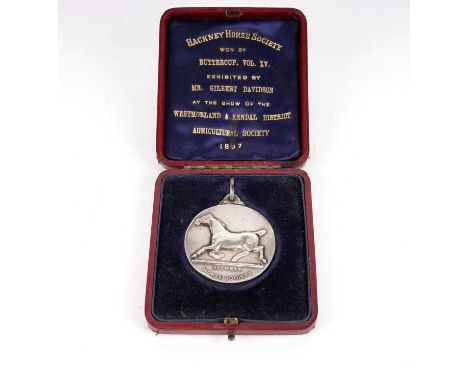 A Victorian Hackney Horse Society winners medal, by Mappin &amp; Webb, London, likely silver, unmarked, 63mm high including b