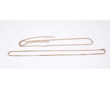 A pair of matching yellow gold chains, originally one muff chain, tests at approximately 9ct gold, 30.1g gross.