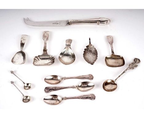A Victorian Exeter silver Fiddle pattern caddy spoon, initialled 'EA', by John Stone, 1857; together with four other silver c