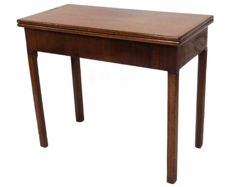 A mahogany card table, with mahogany banding to top, of fold out design, with plain interior, on square tapering legs, 74cm h