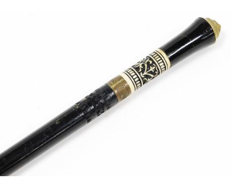 An early 20thC carved  and ebonised sword stick, plain blade and compressed metal pommel, metal tip end, 94cm wide. 