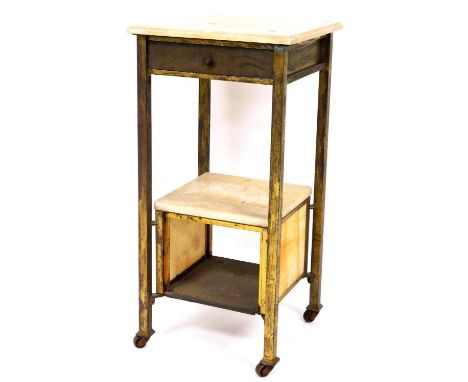 A marble top side table, the square top, on plain oak legs, with open shelf on castors, 81cm high, 43cm wide, 41cm deep.