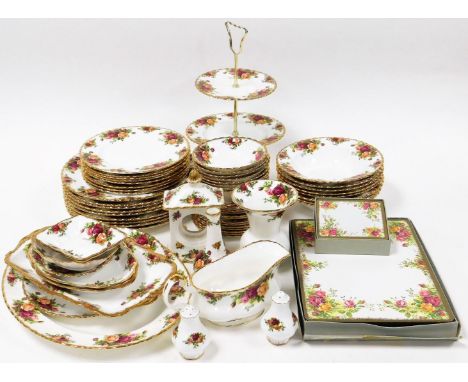 A Royal Albert Old Country Roses pattern part dinner service, comprising twelve cake plates, cake stand, eight soup bowls, ei