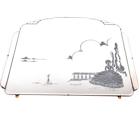 A 20thC Art Deco mirror, of shaped form, set with the figure of a lady in  a garden setting, with a cloud outline and plain b