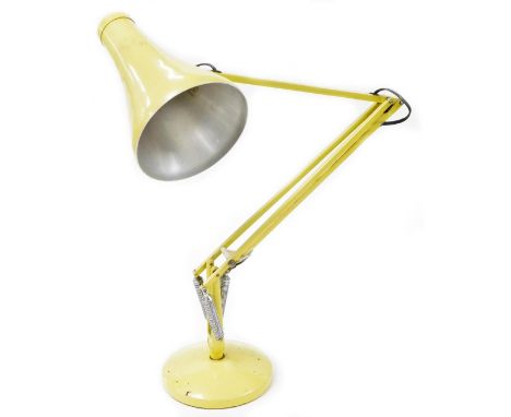 A Herbert Terry and Sons vintage angle poise lamp, with cone shaped shade, 23cm wide, on circular foot, with articulated stem
