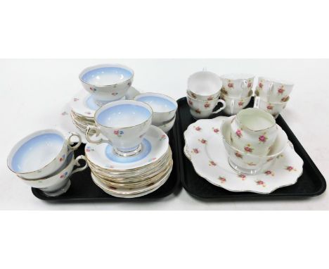 A H F Wedgwood &amp; Co bone china part tea service, comprising six cups, milk jug, sugar bowl and cake plate, together with 