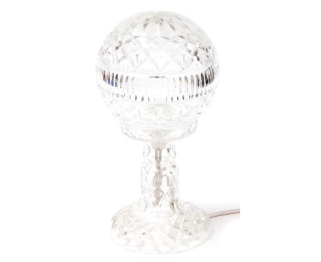 A 20thC glass table lamp, with globular shade with a repeat geometric hobnail cut pattern, on an inverted stem, 31cm high. 