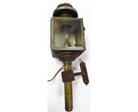A late 19thC brass and glass railway lamp, converted to electricity, 52cm high.