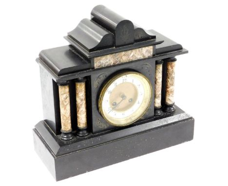 A late 19thC French black marble mantel clock, decorated with elaborate red and white marble pillars, with scroll engraving t