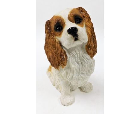 A Sandycast Cavalier King Charles dog, 34cm high.N.B. This lot is sold on behalf of the Rotary Club of Grantham.