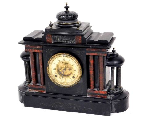 A Victorian slate and marble mantel clock, in an architectural case, surmounted by a compressed dome raised above a fancy Rom