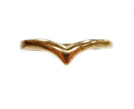 A gold coloured wishbone ring, yellow metal, unmarked.N.B. This lot is sold on behalf of the Rotary Club of Grantham.