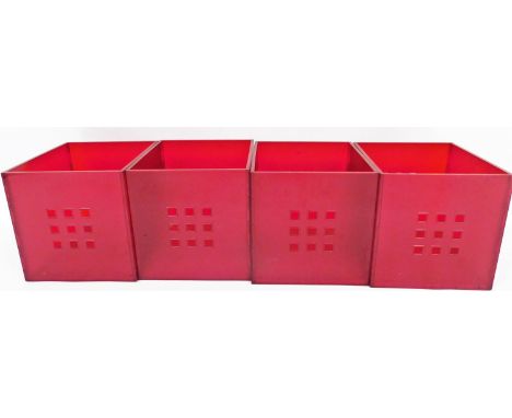 A set of four red plastic organising boxes.N.B. This lot is sold on behalf of the Rotary Club of Grantham.