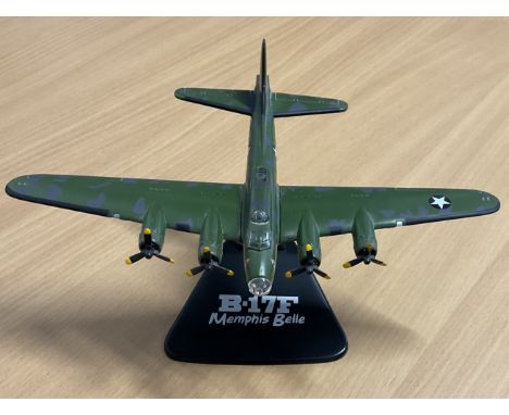 B-17F Memphis Belle Die-Cast Model with Stand in good conditionWe combine postage on multiple winning lots and can ship world