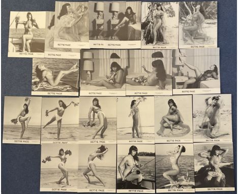 Bettie Page collection of 25 black and white unsigned photos. Page was an American model who gained notoriety in the 1950s fo