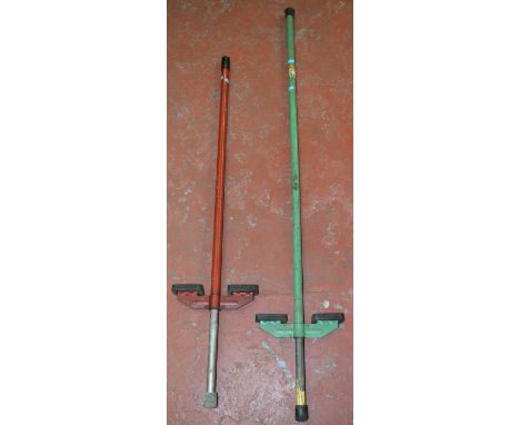 Two vintage pogo sticks