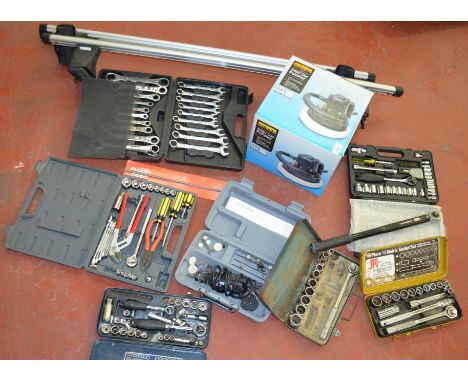 A good selection of car tools inc., socket sets, together with Thule roof bars and a 240V polisher.