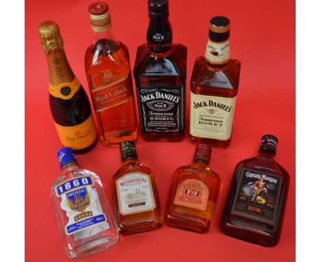 POLICE > 8 assorted bottles of alcohol. [NO RESERVE] [VAT ON HAMMER PRICE]