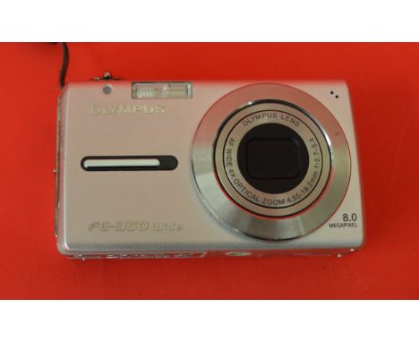POLICE > An Olympus camera FE-350 Wide [NO RESERVE] [VAT ON HAMMER PRICE]