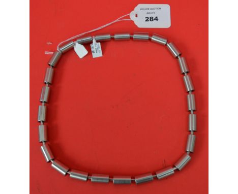 Stainless Steel designer necklace. RRP £225 [VAT INCLUDED IN THE HAMMER PRICE ON THESE LOT - note this doesn't affect non-VAT