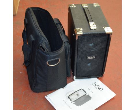 A Phil Jones AAP "Cub" guitar amp/speaker and carry case.