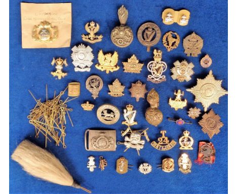 Military Badges, a collection of cap badges, collar badges, shoulder titles, etc. to include Hampshire 1st Volunteer Btn, Roy