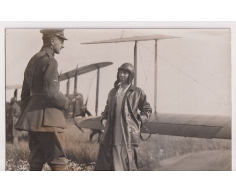 Postcard, WWI, scarce RP showing Queen Elizabeth of Belgium in flying helmet &amp; coat by biplane with army officer (vg) (1)